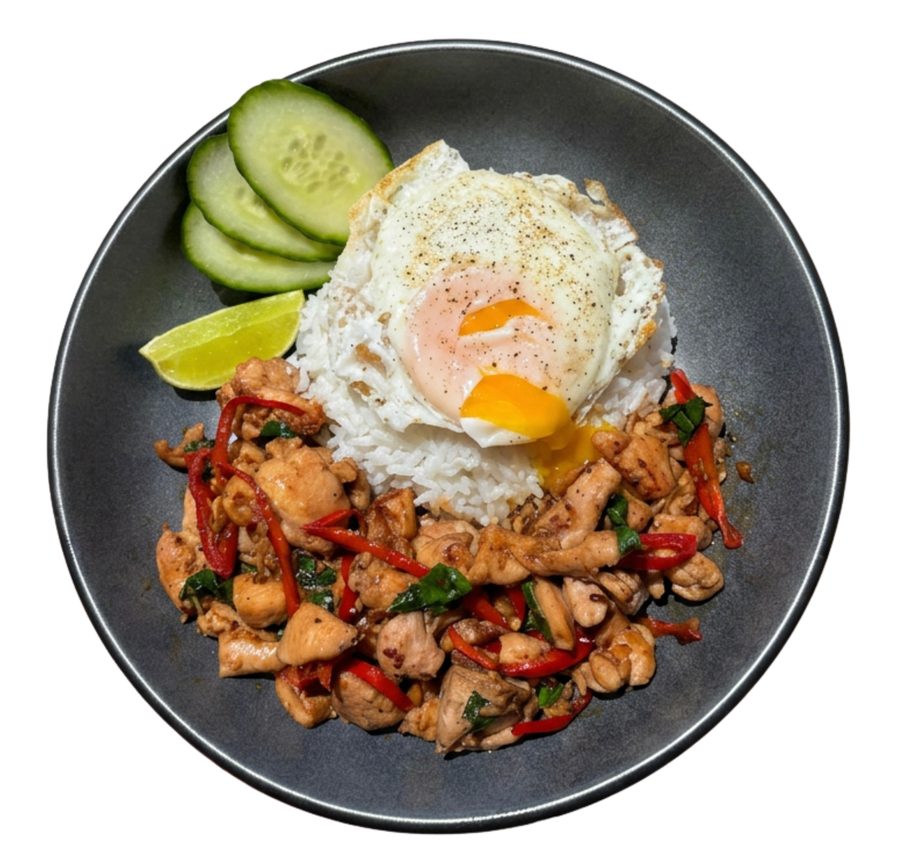 Pad kra pao — Thai holy-basil chicken with chilies over jasmine rice, topped with a fried egg